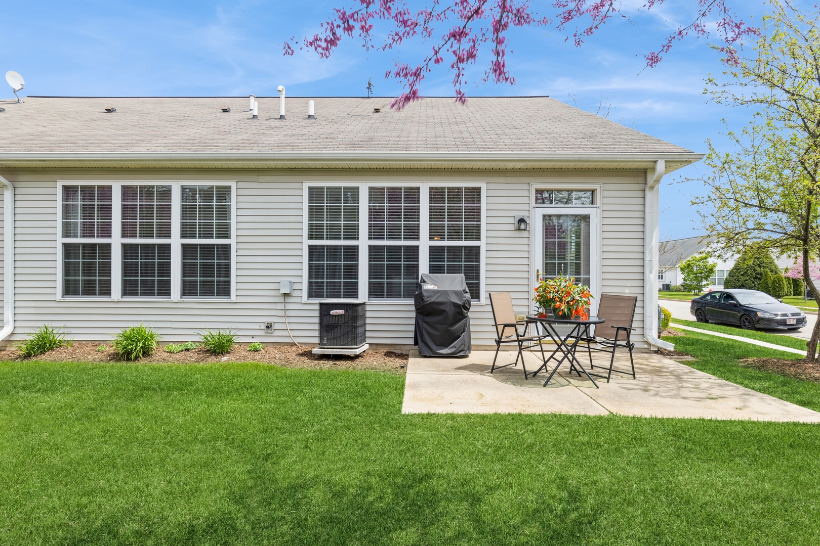 13472 Delaney Road Huntley, IL 60142 - Photo 3 of 16 a view of a house with sitting area and garden