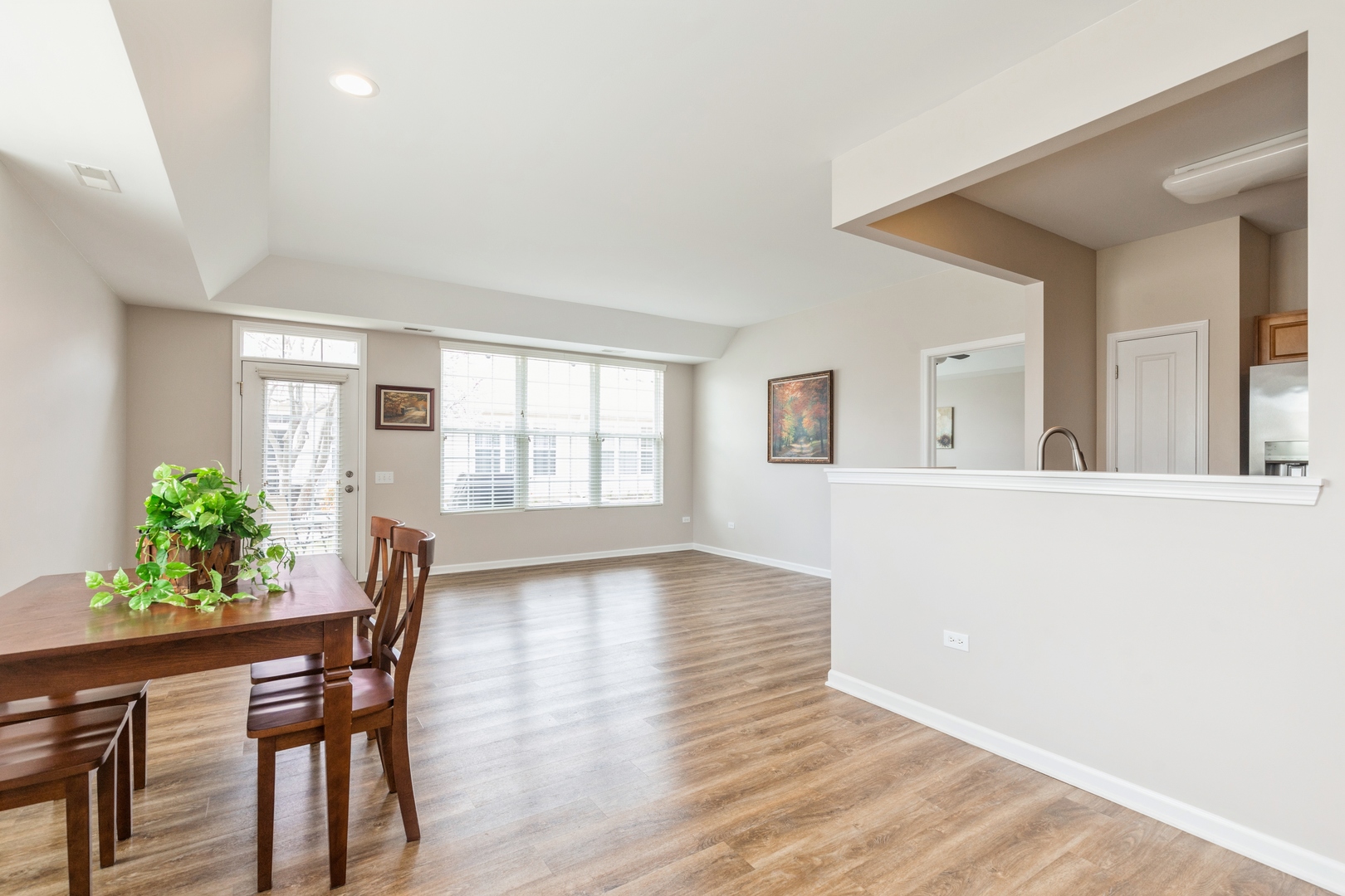 13472 Delaney Road Huntley, IL 60142 - Photo 5 of 16 a view of a livingroom with furniture and a potted plant