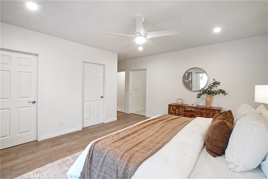 8550 Raviller Drive Downey, CA 90240 - Photo 15 of 38 Primary bedroom with dual closets