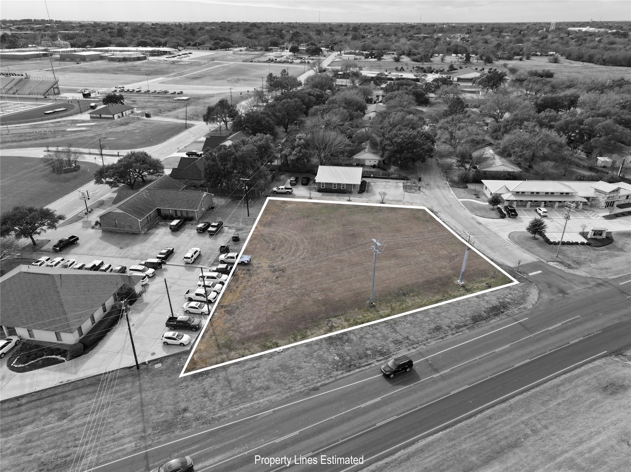 0 Longhofer Street Brenham, TX 77833 - Photo 3 of 10 an aerial view of multiple houses with outdoor space