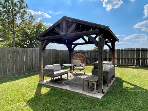 a garden view with a seating space