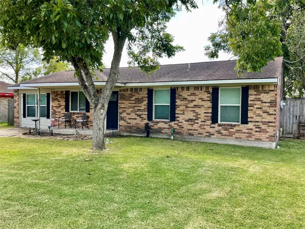 a house with garden in front of it