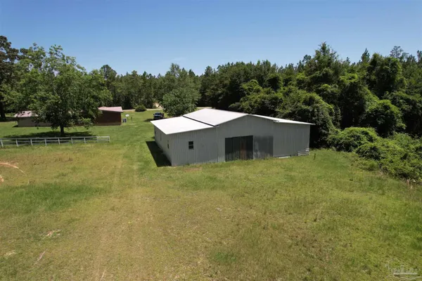 a view of a lake with a yard