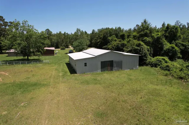 a view of a lake with a yard