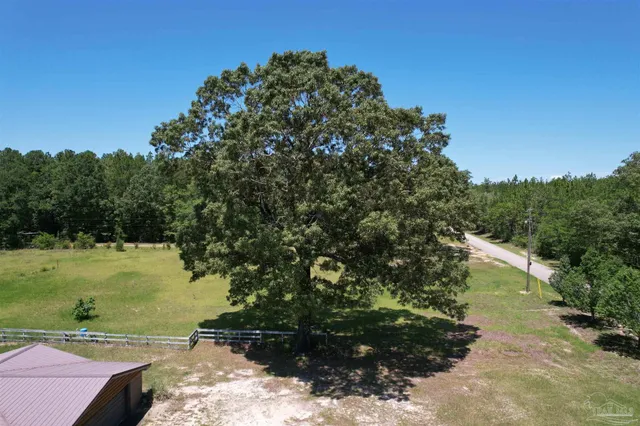 a view of a lake with a yard