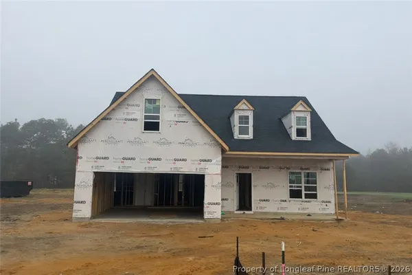 a view of a house with a garage