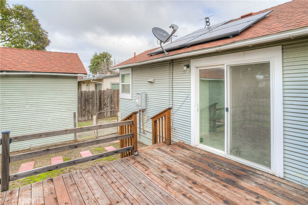 1568 Link Street Corning, CA 96021 - Photo 22 of 28 a yellow house with a outdoor space