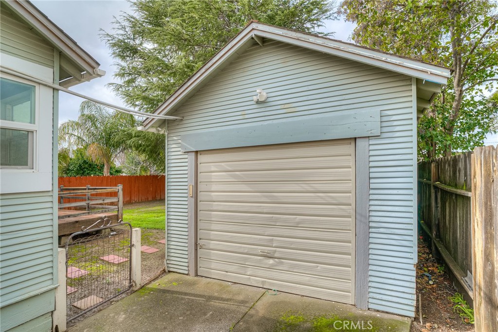 1568 Link Street Corning, CA 96021 - Photo 27 of 28 a small white building with a white roof and a large window