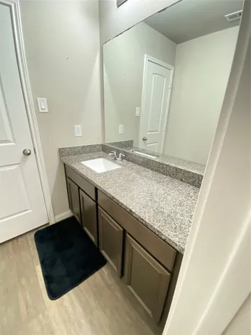 a bathroom with a toilet a sink and a bathtub