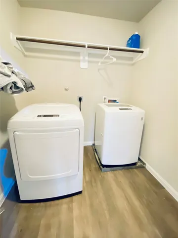 a bathroom with a sink toilet and a mirror