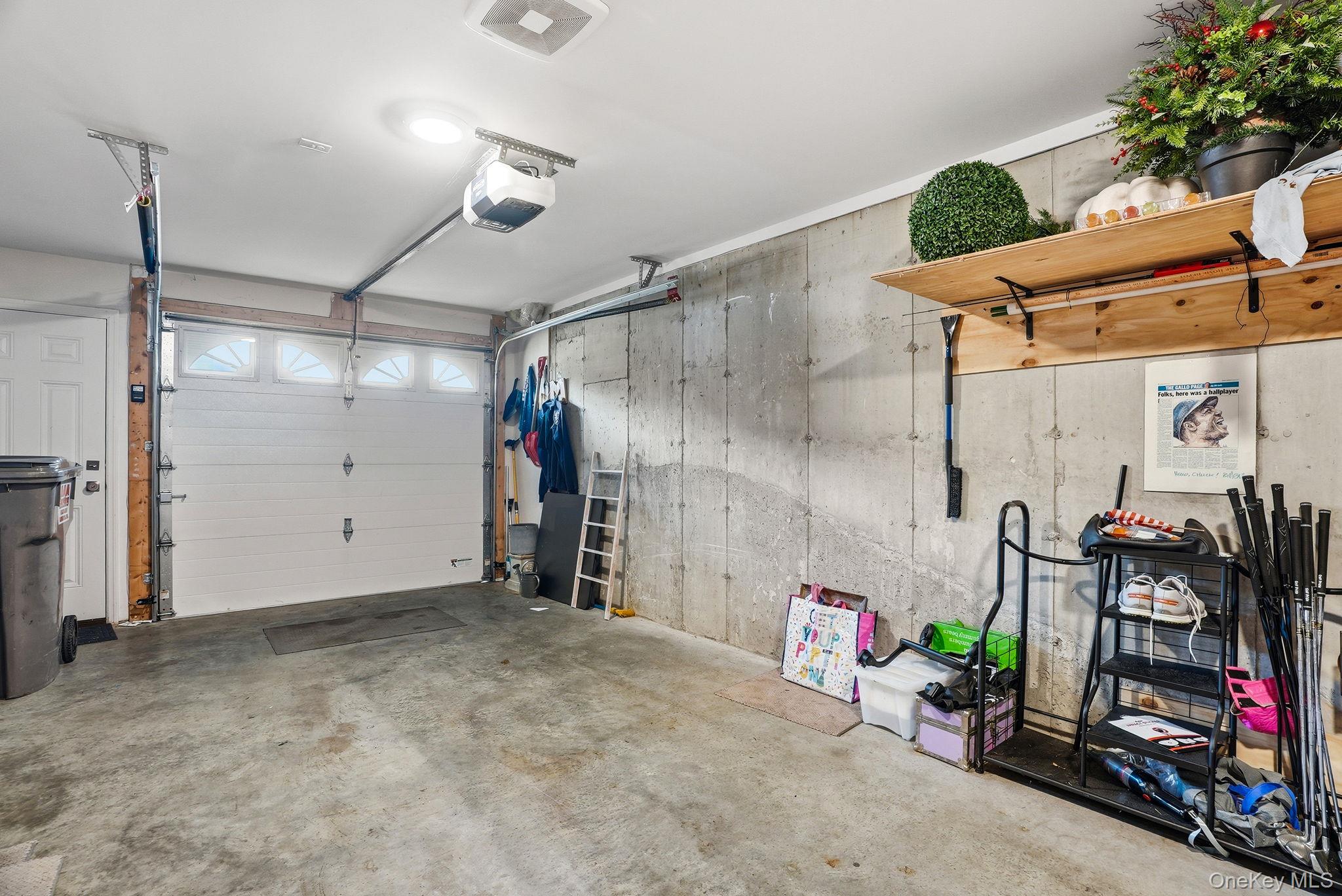 8 Muscoot River Road Granite Springs, NY 10527 - Photo 32 of 40 Single-car garage featuring a concrete floor and exposed foundation walls