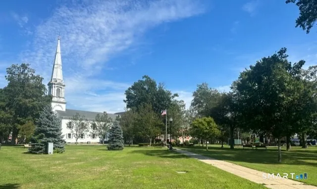 a view of building with trees