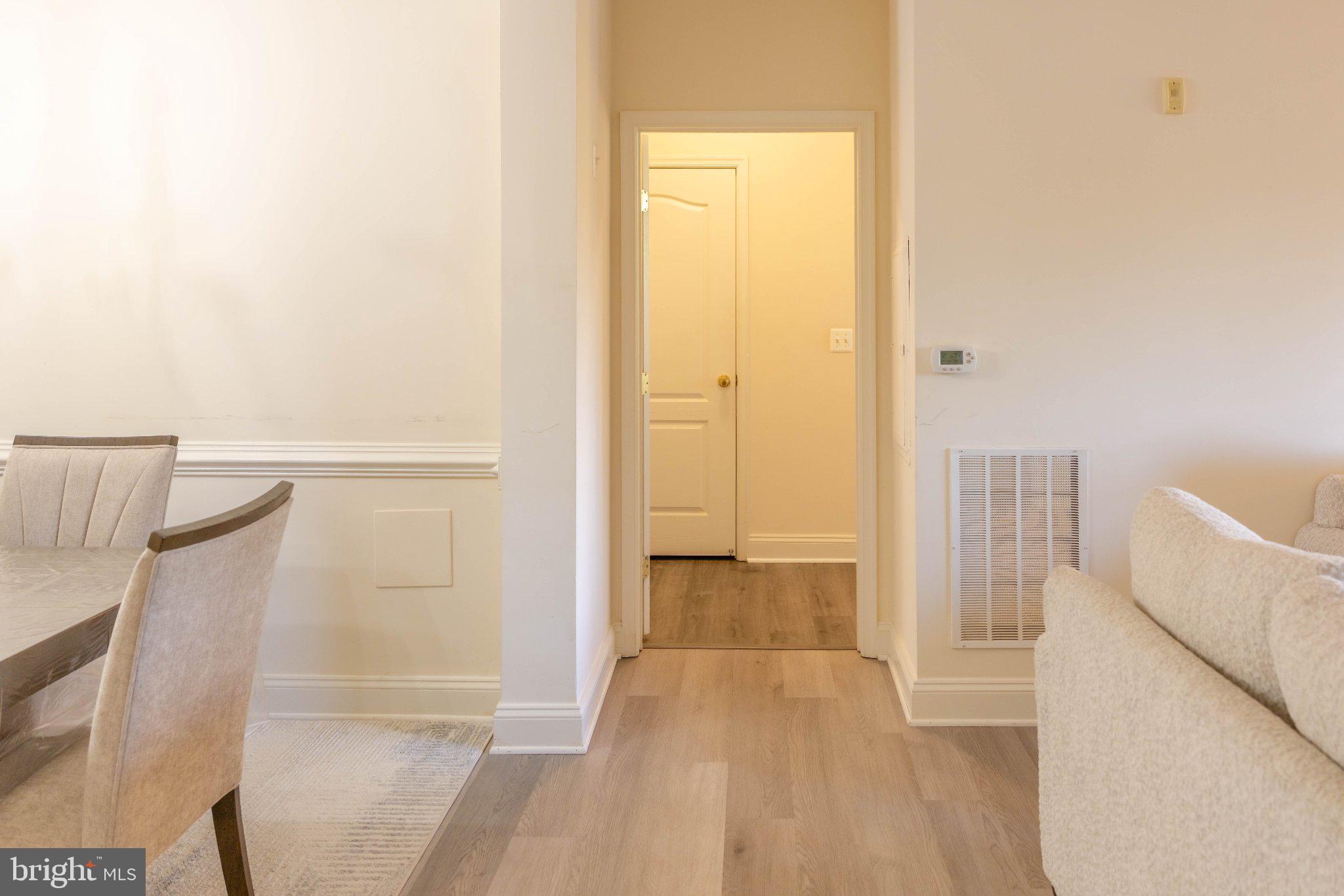 12824 Clarksburg Square Road, Unit 105 Clarksburg, MD 20871 - Photo 74 of 96 Inviting entryway with warm tones.