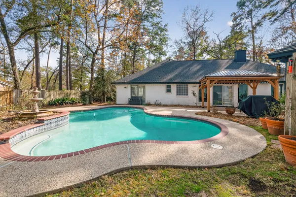 a view of a house with swimming pool