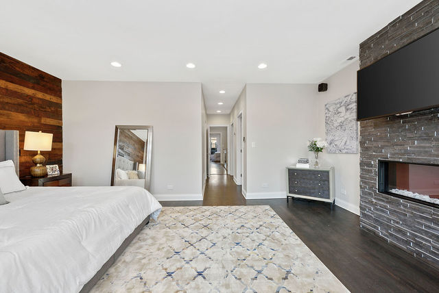 1850 North Orchard Street Chicago, IL 60614 - Photo 14 of 26 a bedroom with a bed and a flat screen tv