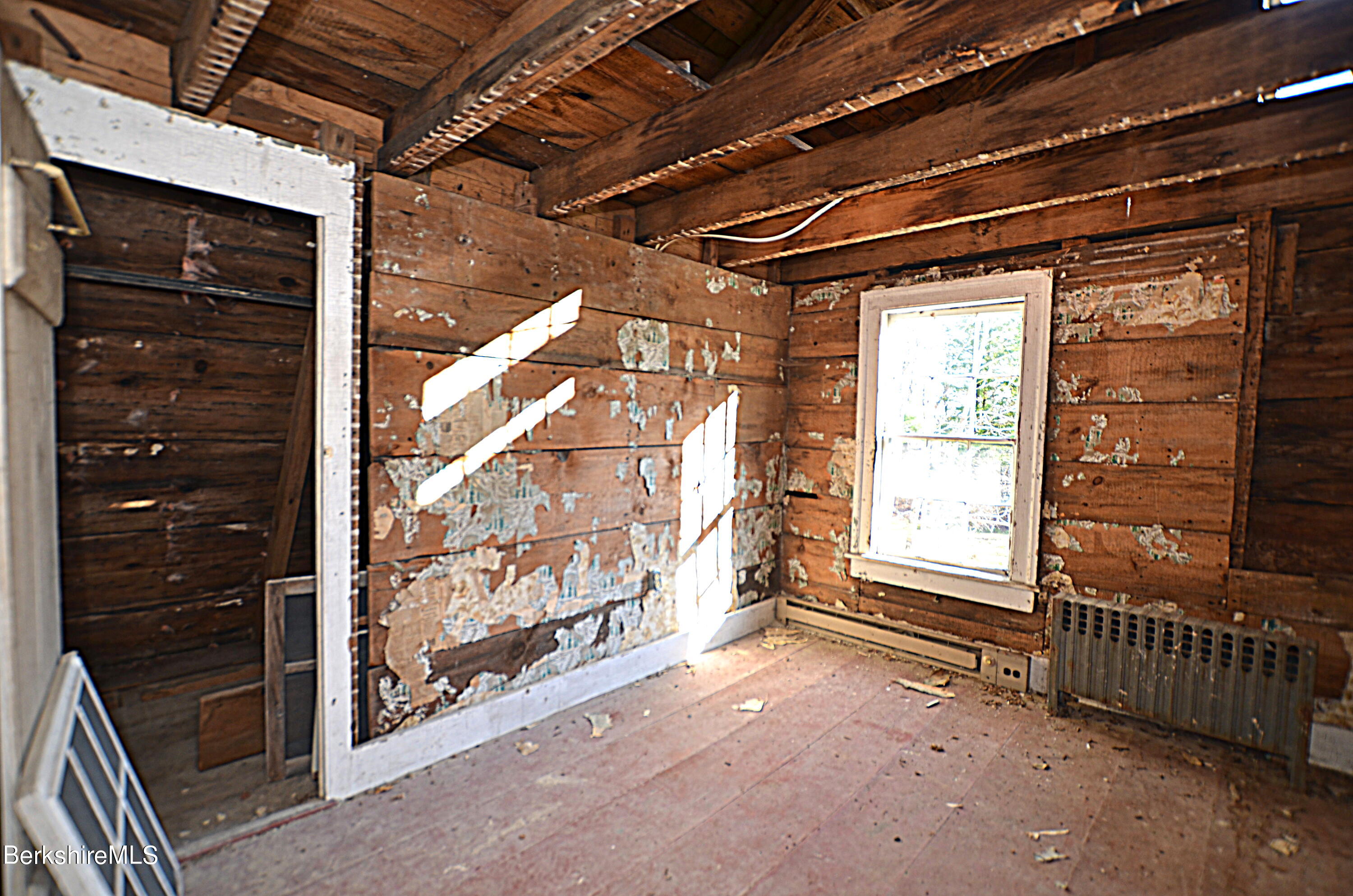 178 New Hartford Road Sandisfield, MA 01255 - Photo 28 of 62 a view of an empty room with a window