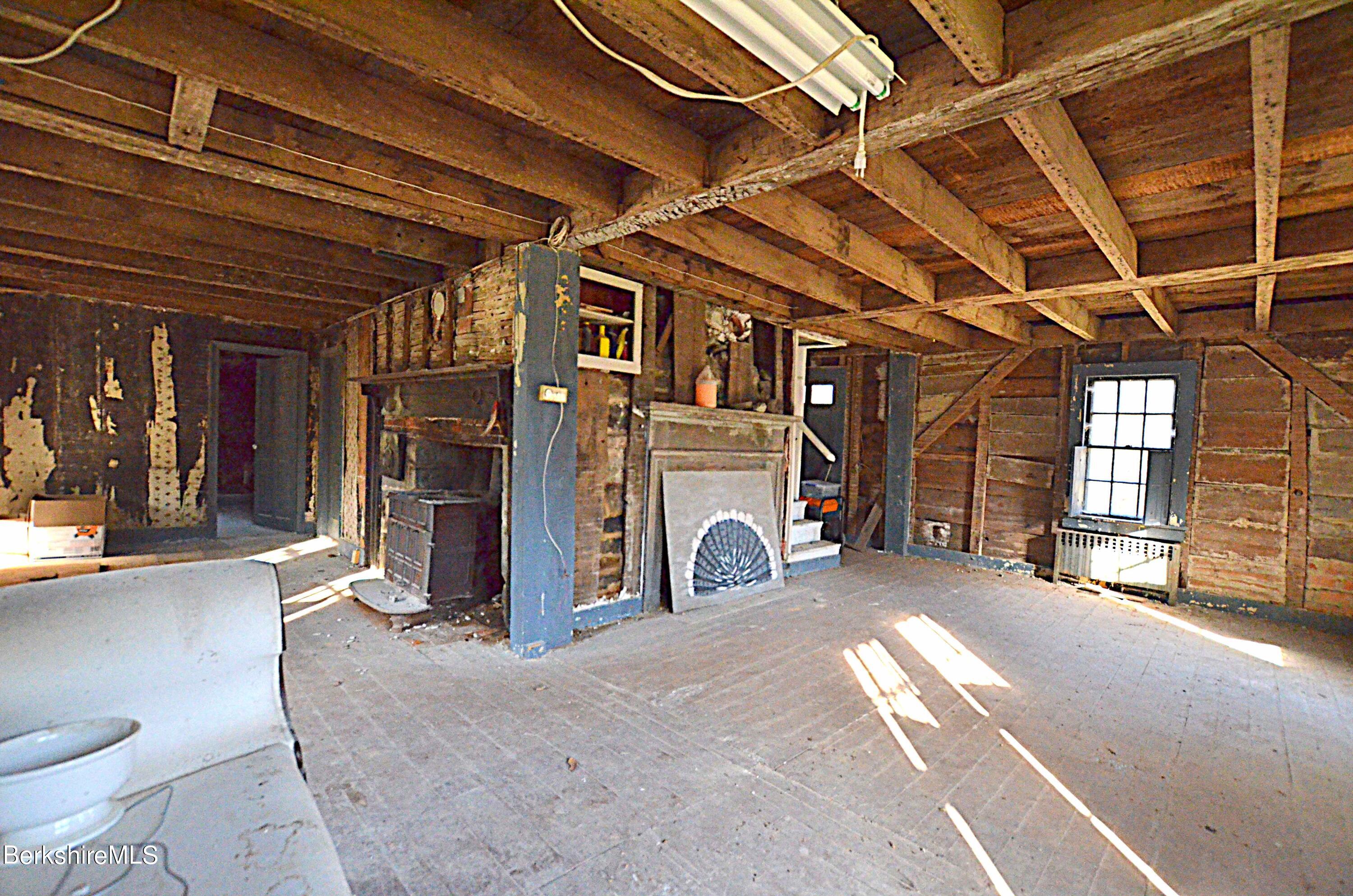 178 New Hartford Road Sandisfield, MA 01255 - Photo 3 of 62 a view of a room with gym equipment