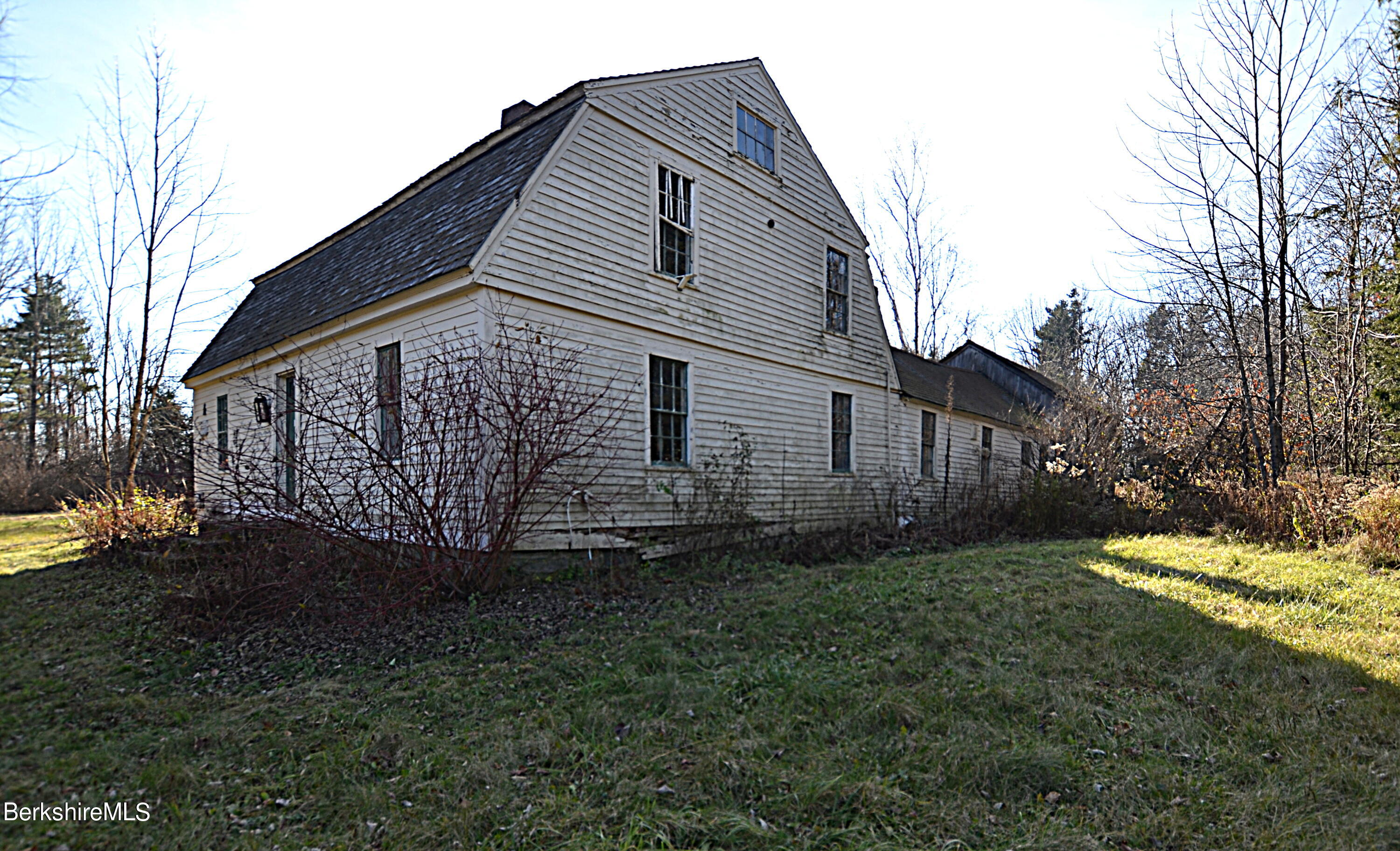 178 New Hartford Road Sandisfield, MA 01255 - Photo 59 of 62 a front view of a house with a yard