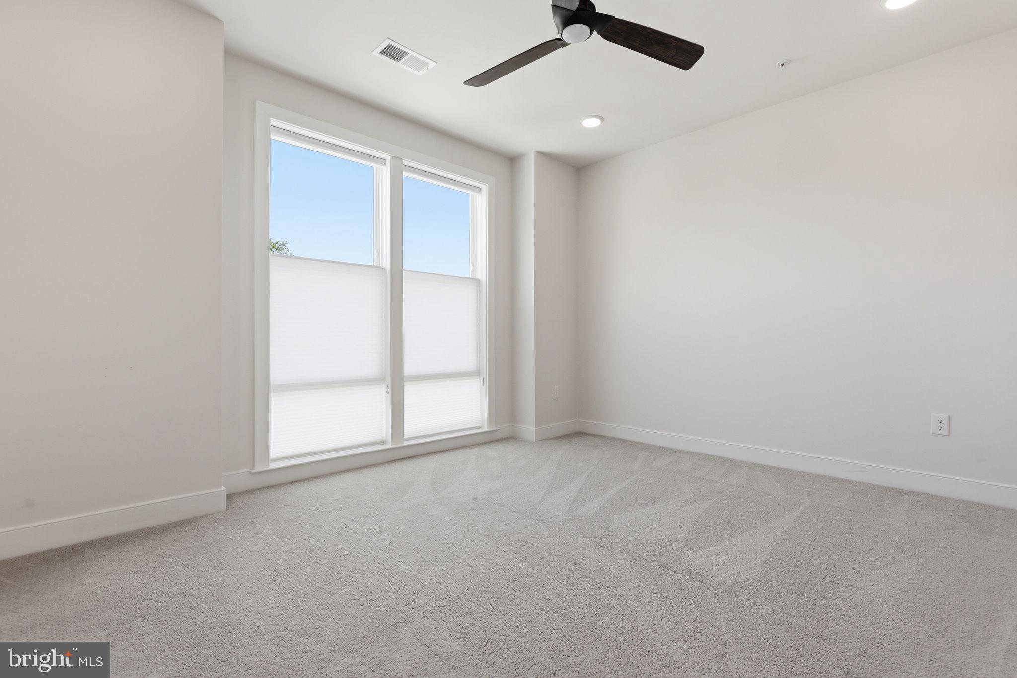 11200 Reston Station Boulevard, Unit 205 Reston, VA 20190 - Photo 18 of 39 Main Bedroom