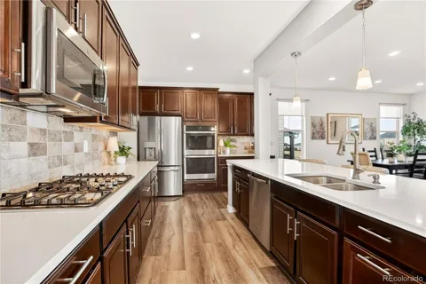 $975,000 | 23099 East Narrowleaf Drive, Aurora, CO 80016