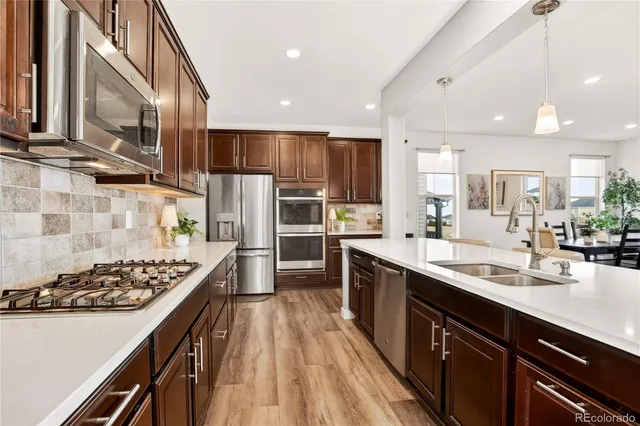 $975,000 | 23099 East Narrowleaf Drive, Aurora, CO 80016