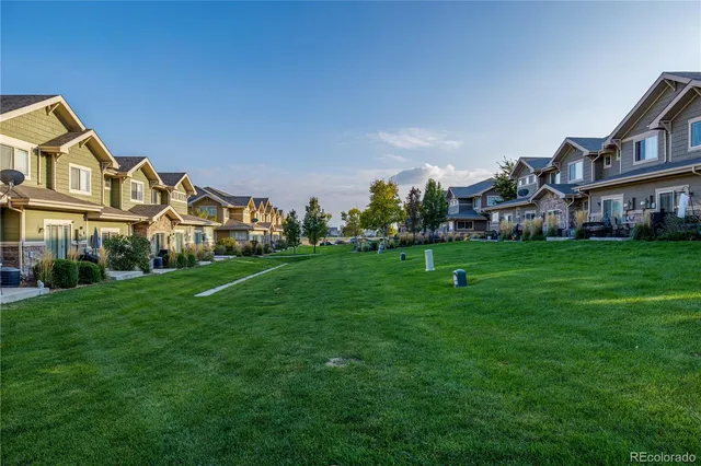a view of a house with a big yard