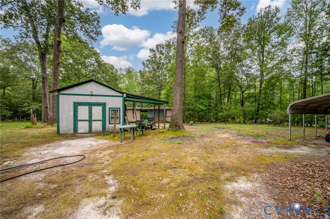 17707 Loving Union Road Disputanta, VA 23842 - Photo 35 of 42 Detached utility building with double doors and a
