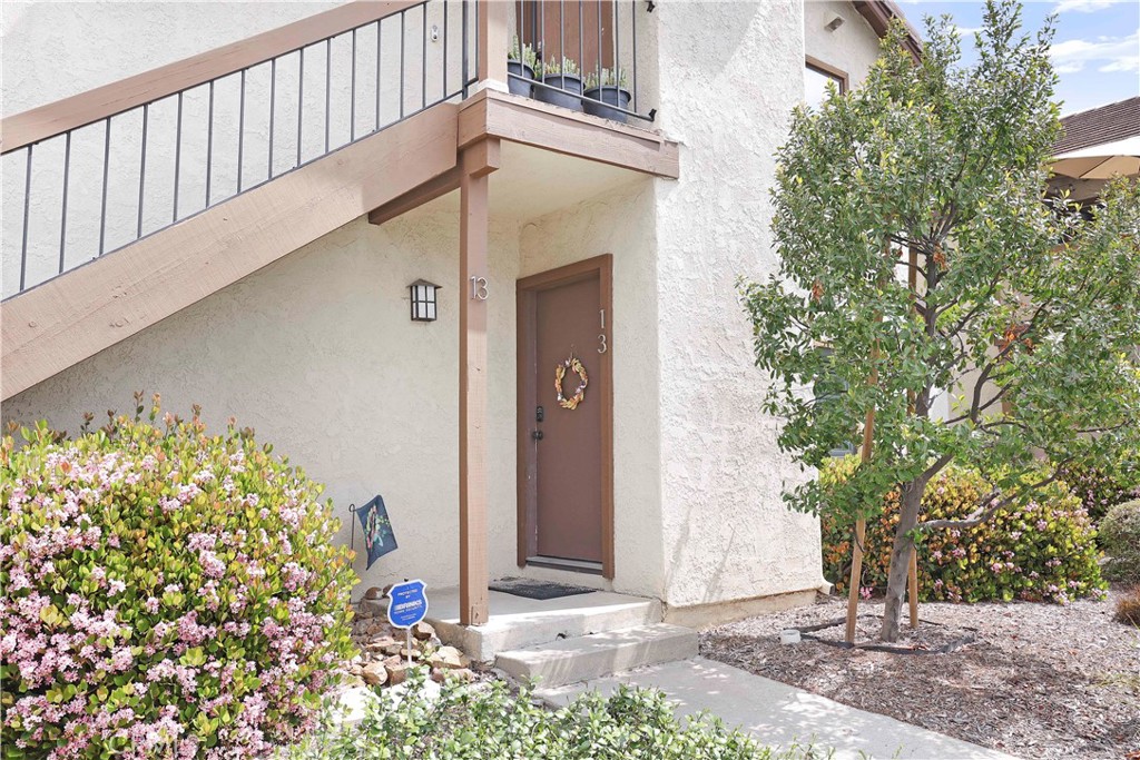 540 North Brea Boulevard, Unit 13 Brea, CA 92821 - Photo 1 of 1 a front view of a house with garden