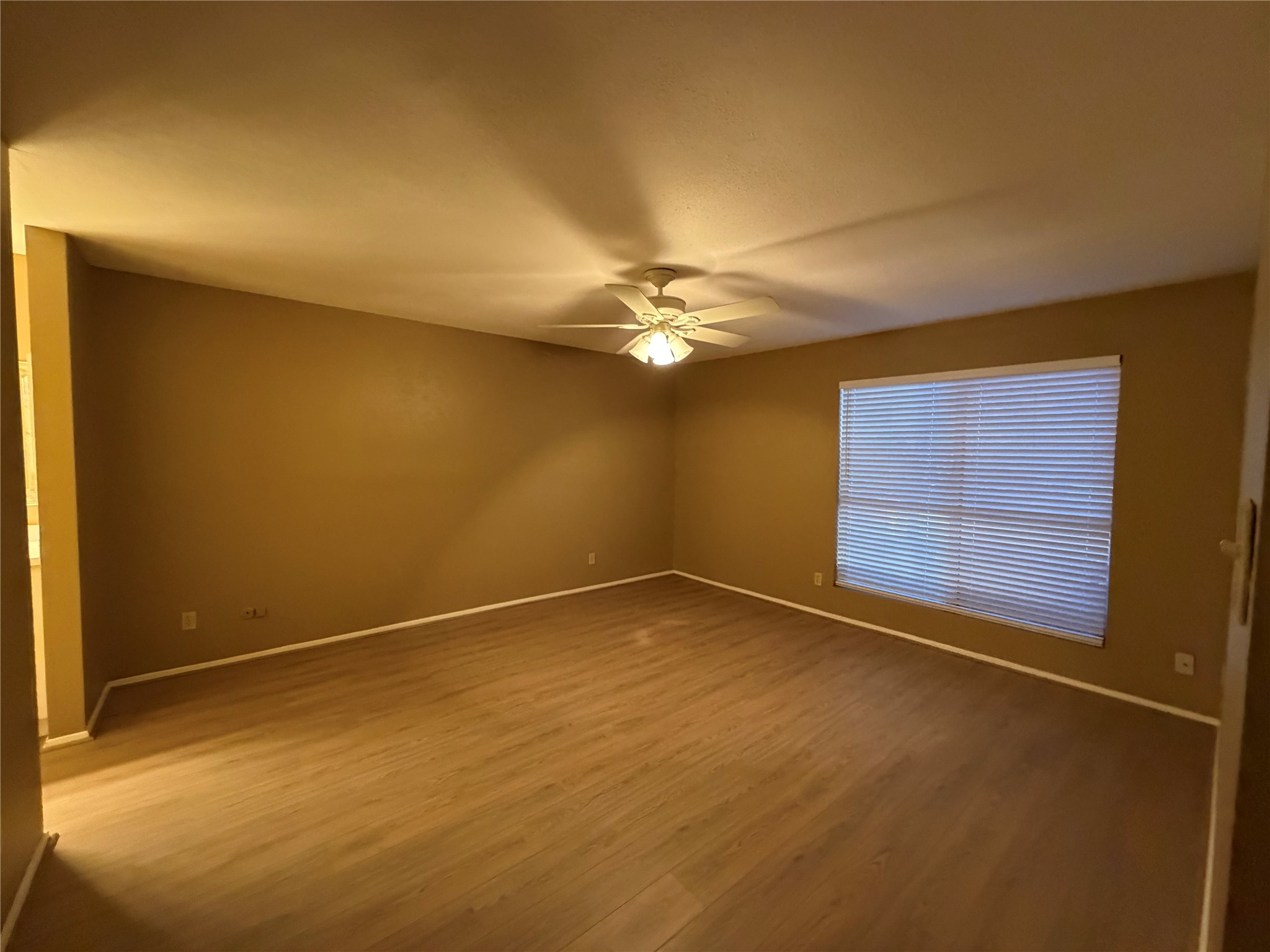 14515 Wunderlich Drive, Unit 703 Houston, TX 77069 - Photo 15 of 25 a view of an empty room with a window