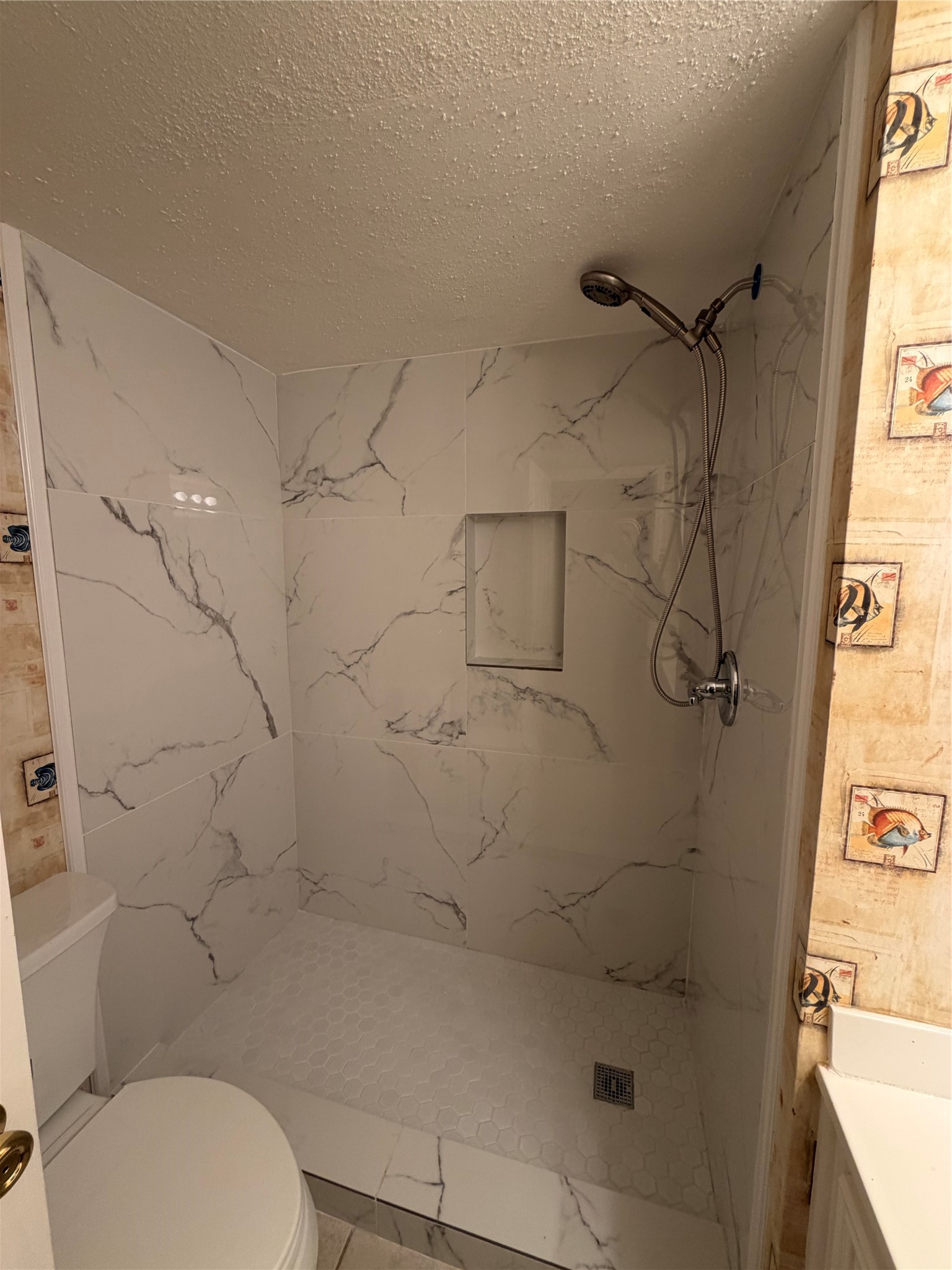 14515 Wunderlich Drive, Unit 703 Houston, TX 77069 - Photo 18 of 25 a bathroom with a shower and toilet