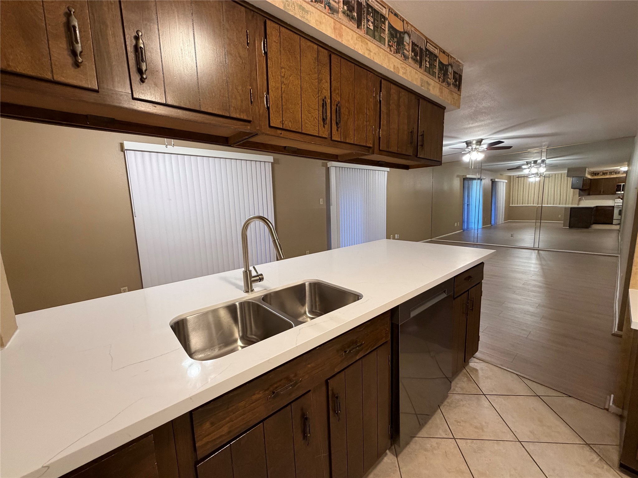 14515 Wunderlich Drive, Unit 703 Houston, TX 77069 - Photo 24 of 25 a kitchen with a sink and cabinets