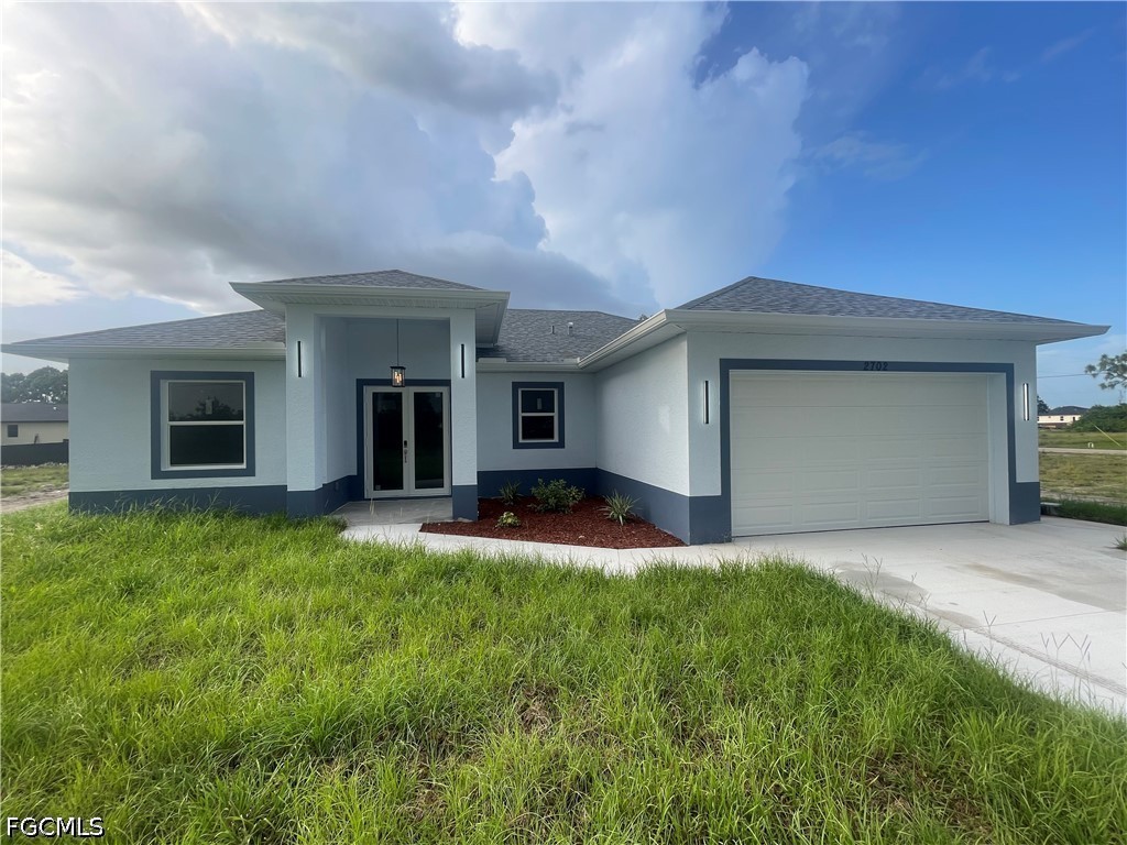 2702 30th Street Southwest Lehigh Acres, FL 33976 - Photo 1 of 12