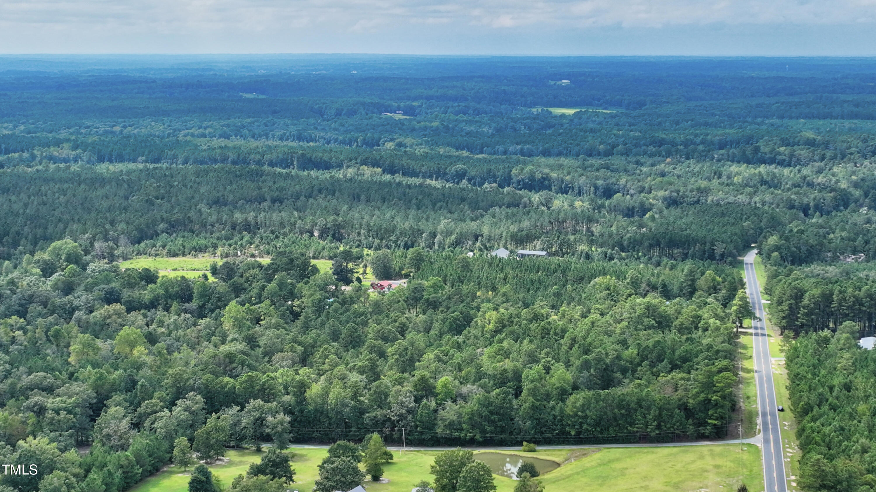 367 Needmore Road Cameron, NC 28326 - Photo 6 of 8 a view of a field with an ocean