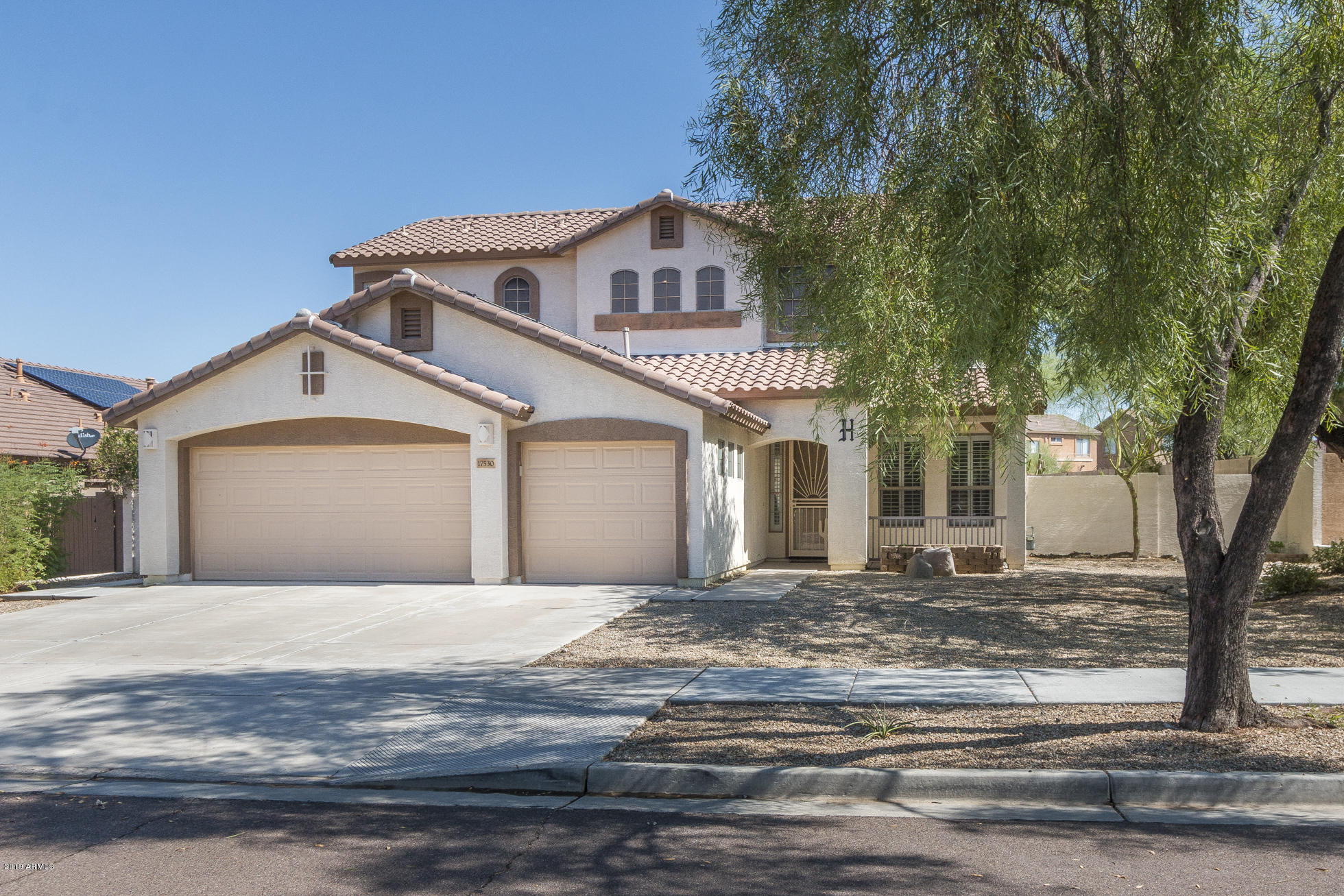17530 West Rock Ledge Road Goodyear, AZ 85338 - Photo 2 of 54 2) FRONT OF HOME