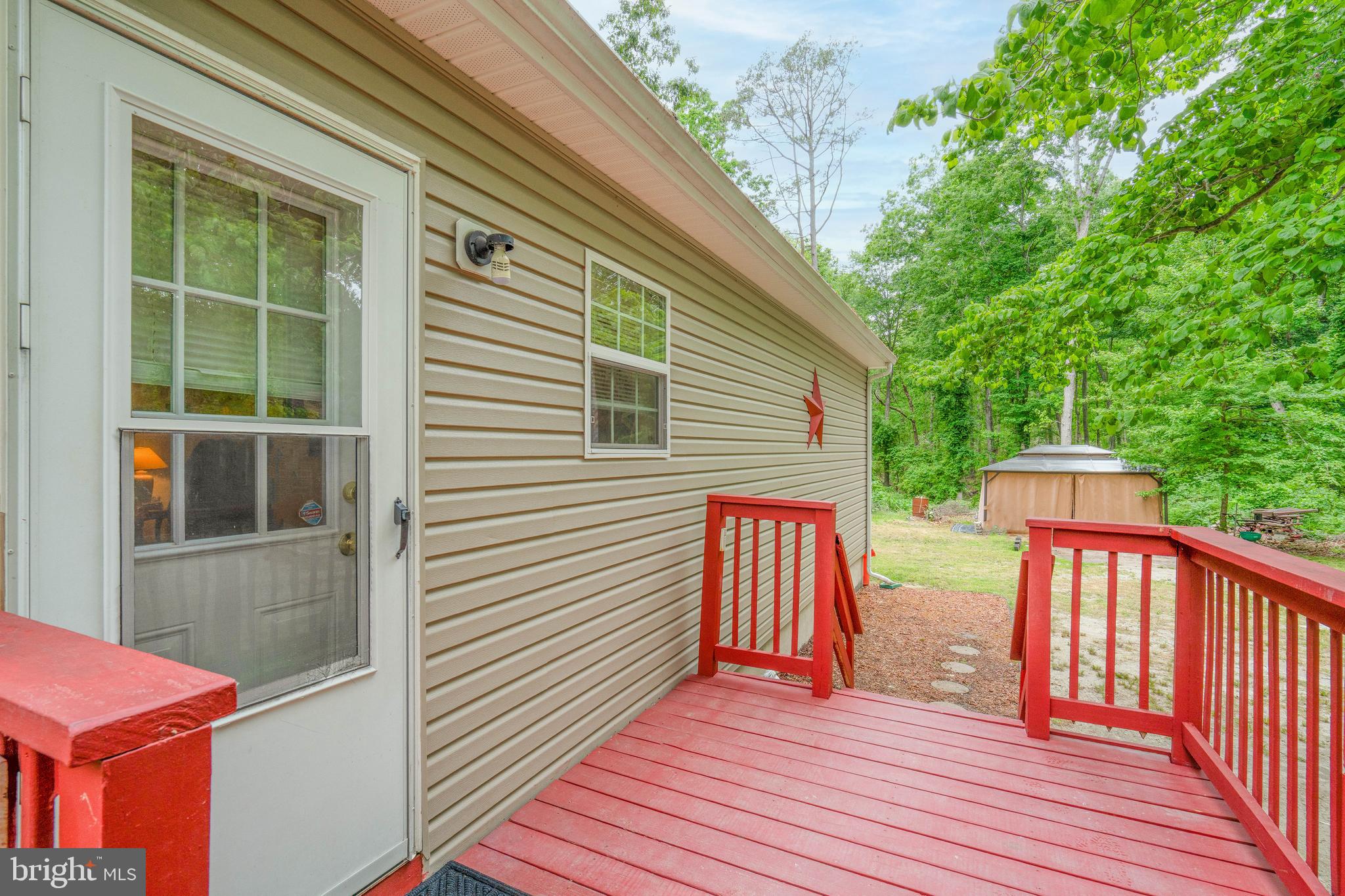 315 Beech Road Millville, NJ 08332 - Photo 4 of 21 a view of a house with a deck