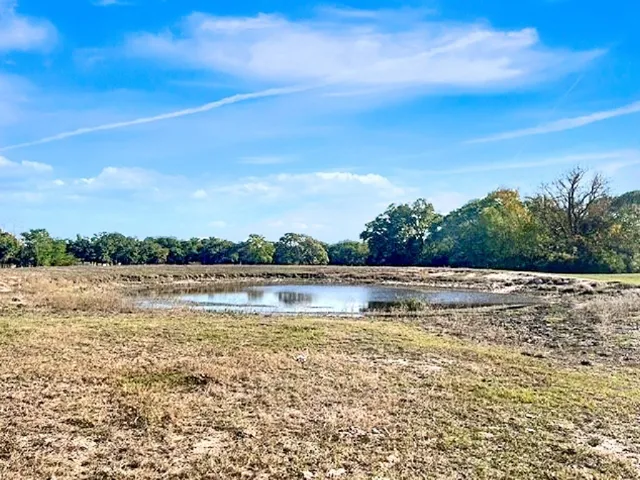 a view of lake view with mountain in the back