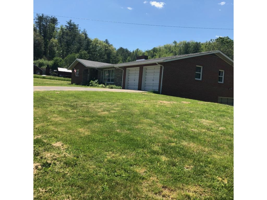 488 Lowell Stalcup Road Butler, TN 37640 - Photo 12 of 34 RIGHT SIDE YARD OF HOME