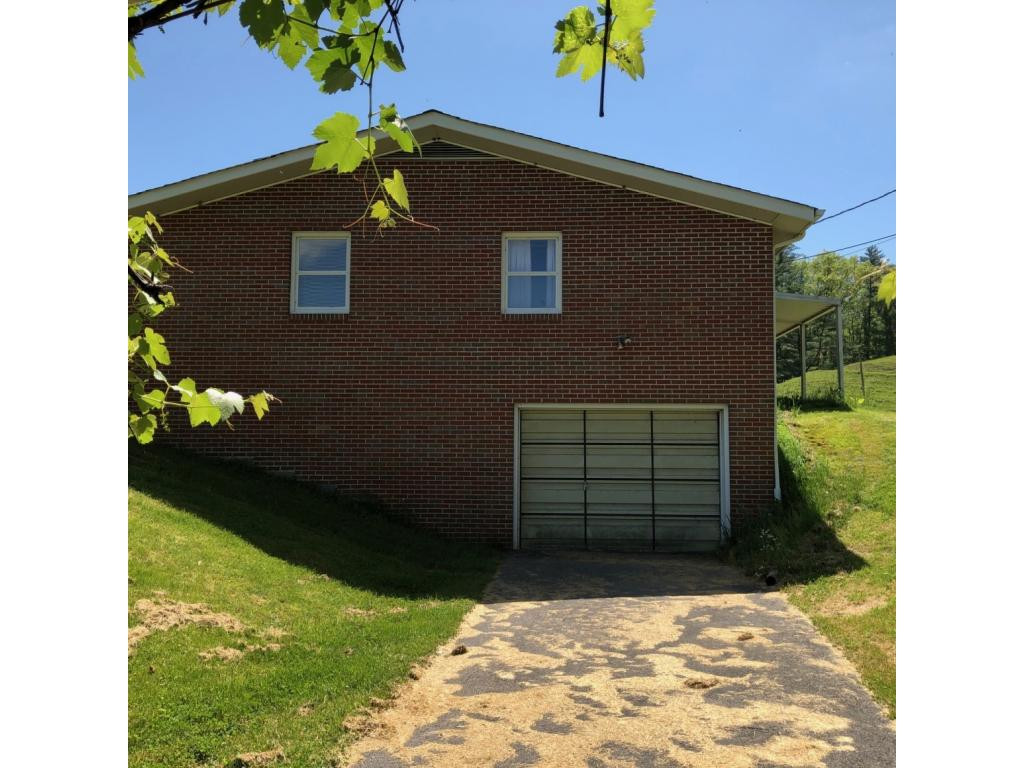 488 Lowell Stalcup Road Butler, TN 37640 - Photo 3 of 34 GARAGE ENTRY TO BASEMENT