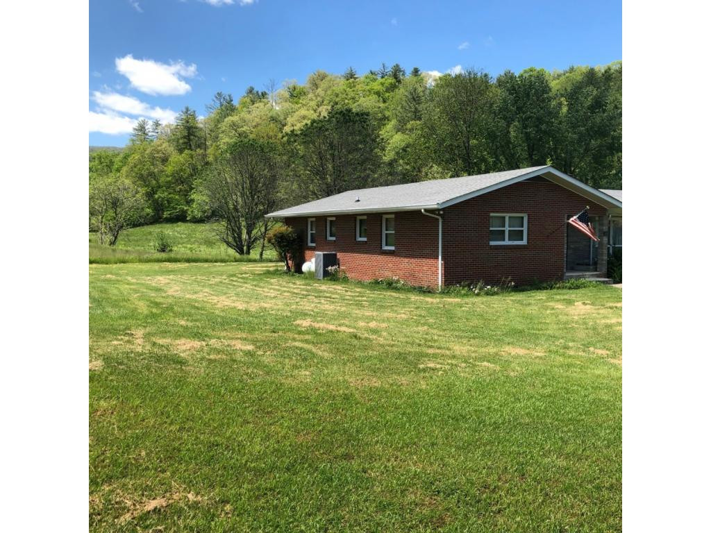 488 Lowell Stalcup Road Butler, TN 37640 - Photo 4 of 34 LEFT SIDE OF HOME