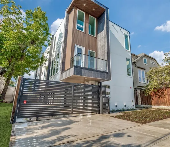 a view of a house with a garage