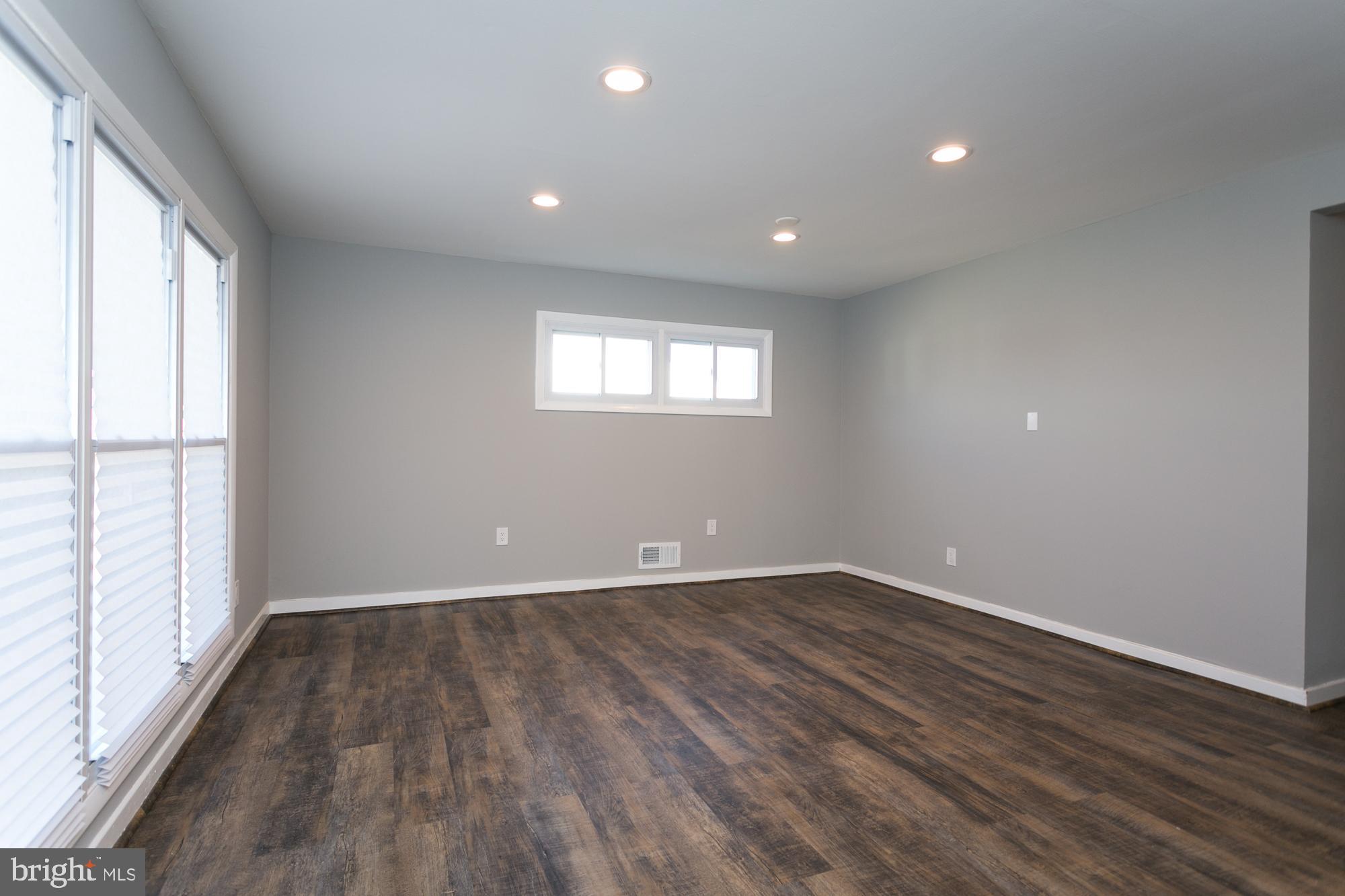 6227 Catalpha Road Baltimore, MD 21214 - Photo 3 of 22 Spacious Living Room w new windows