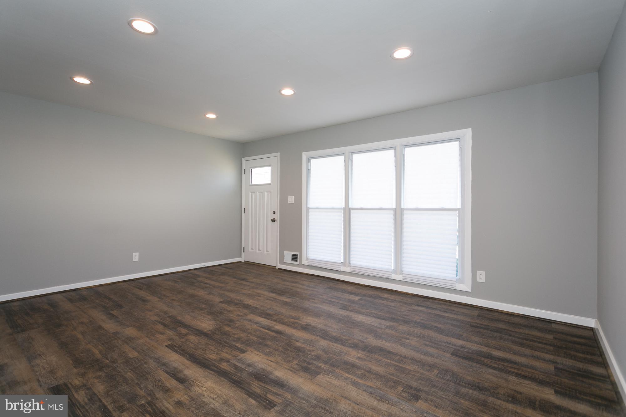 6227 Catalpha Road Baltimore, MD 21214 - Photo 4 of 22 Bright living room w Recessed light