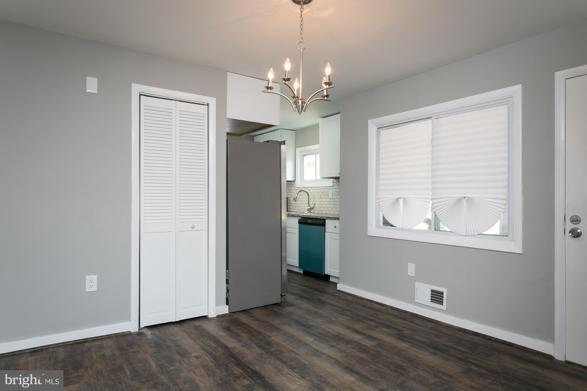 6227 Catalpha Road Baltimore, MD 21214 - Photo 6 of 22 Dining Room leads to Kitchen