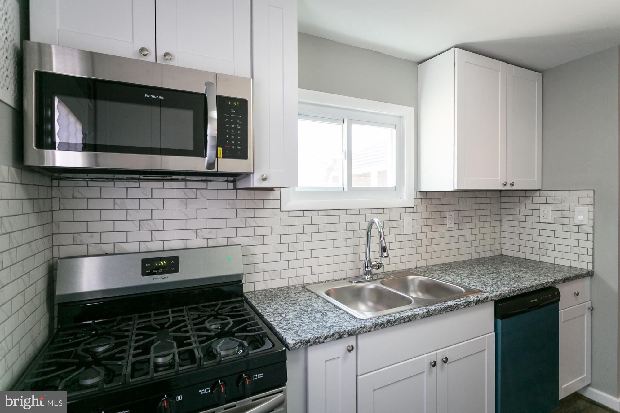 6227 Catalpha Road Baltimore, MD 21214 - Photo 7 of 22 Kitchen w/ all new SS Appliances