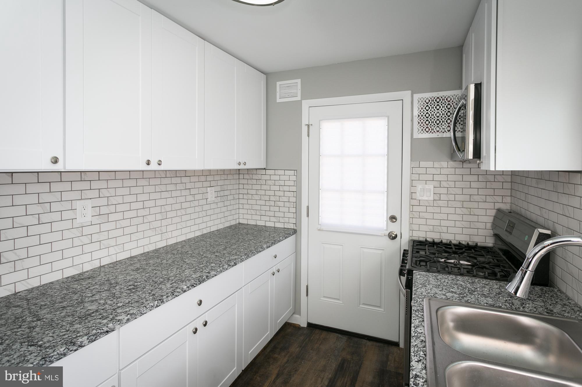 6227 Catalpha Road Baltimore, MD 21214 - Photo 8 of 22 New Kitchen w/ Granite Countertops