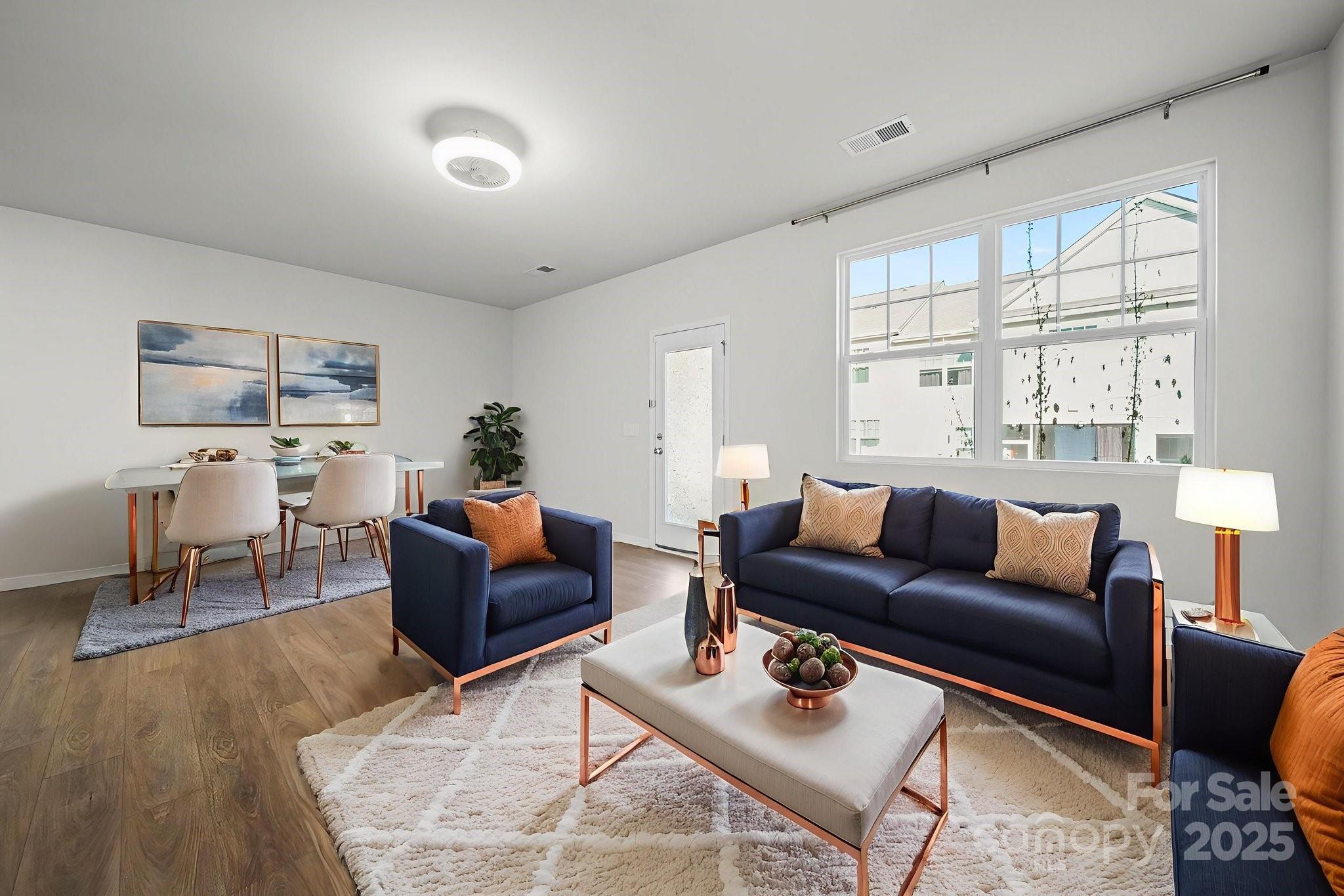 808 Gable Oak Lane Fort Mill, SC 29708 - Photo 16 of 41 a living room with furniture and a large window