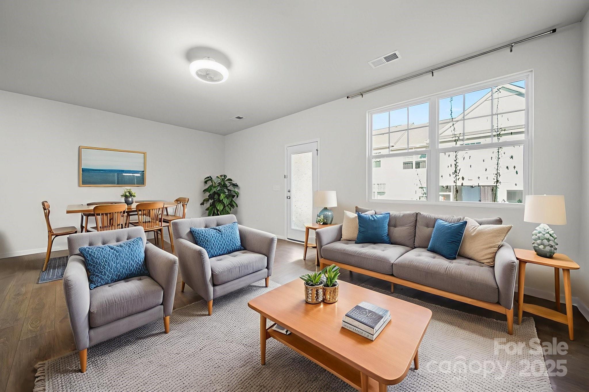 808 Gable Oak Lane Fort Mill, SC 29708 - Photo 18 of 41 a living room with furniture and a large window