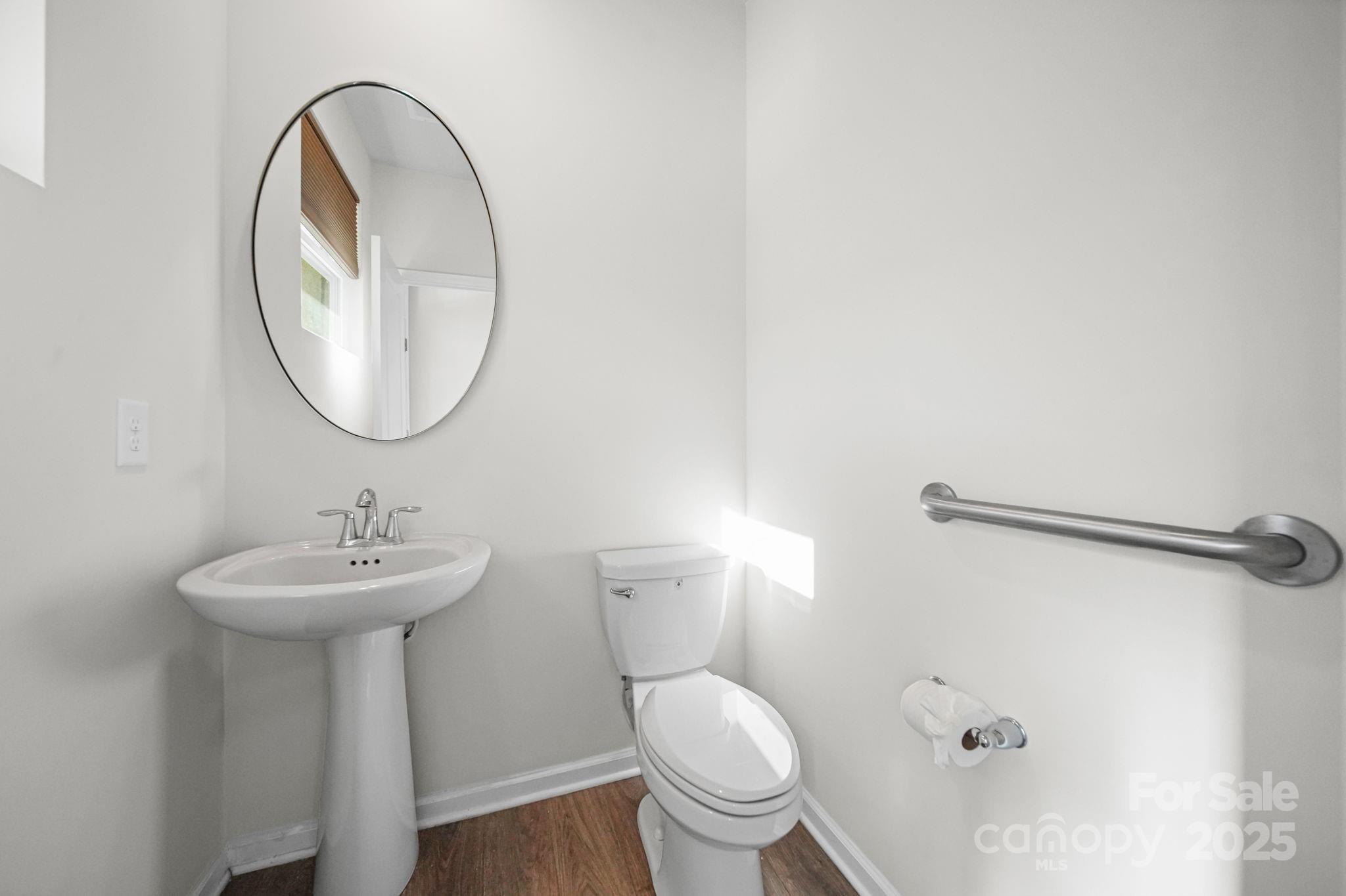 808 Gable Oak Lane Fort Mill, SC 29708 - Photo 3 of 41 a bathroom with a sink a mirror and a toilet