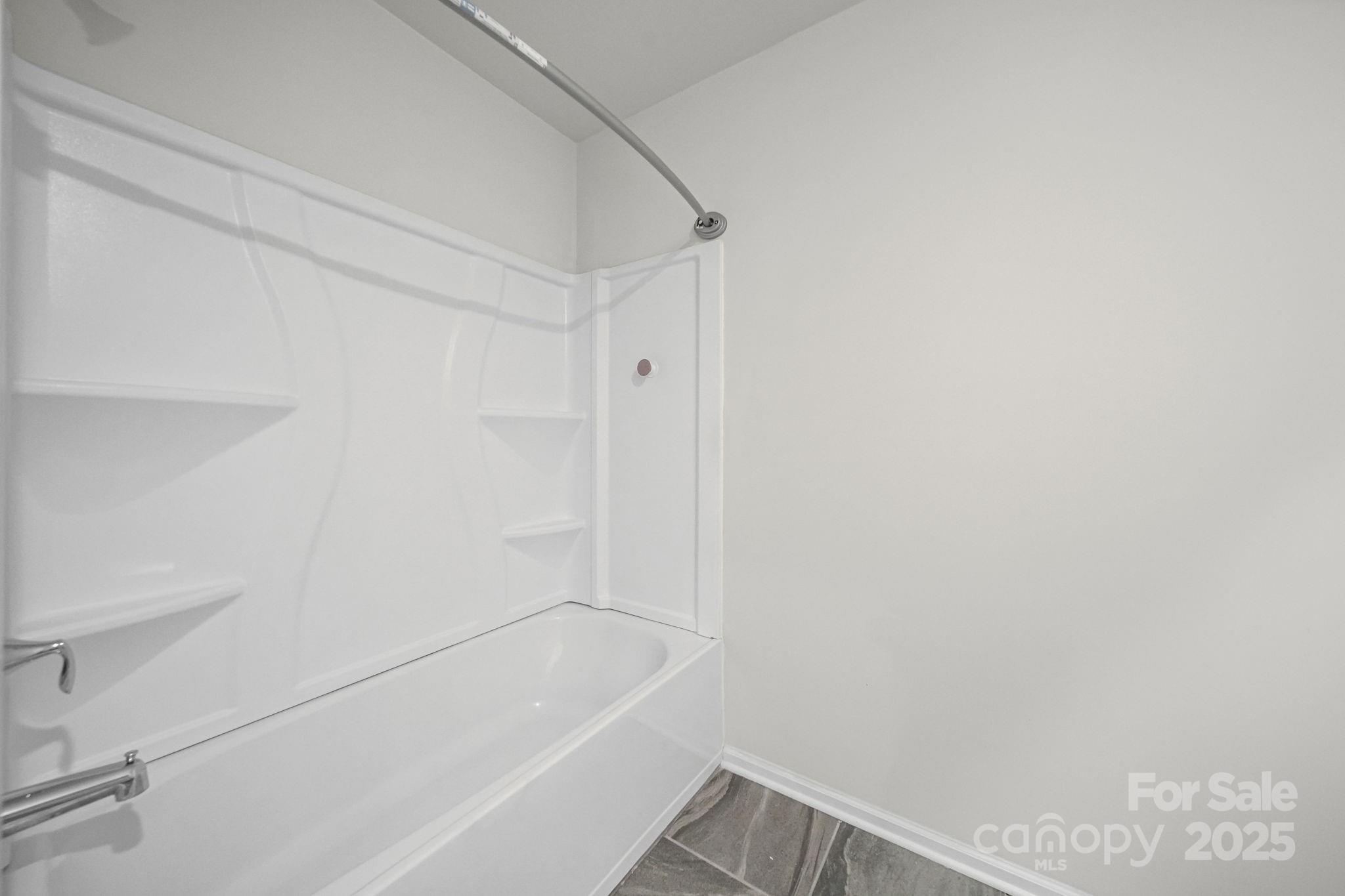808 Gable Oak Lane Fort Mill, SC 29708 - Photo 35 of 41 a bathroom with a bathtub