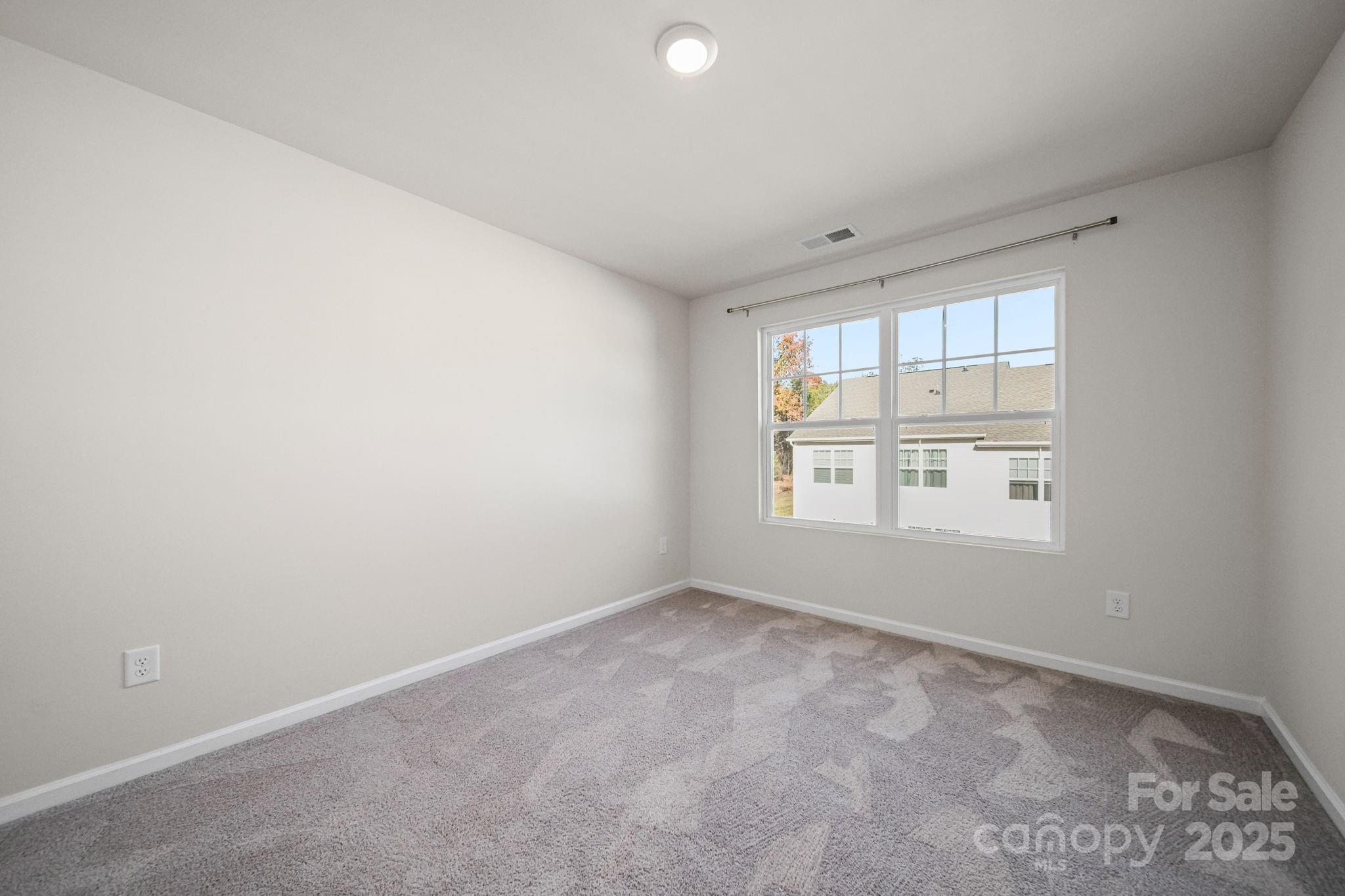 808 Gable Oak Lane Fort Mill, SC 29708 - Photo 38 of 41 an empty room with a window